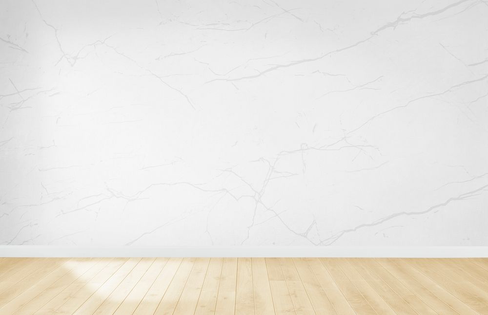 White wallpaper in an empty room with wooden floor