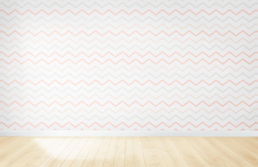 Pastel wallpaper in an empty room with wooden floor