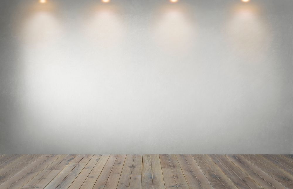 Gray wall with a row of spotlights in an empty room