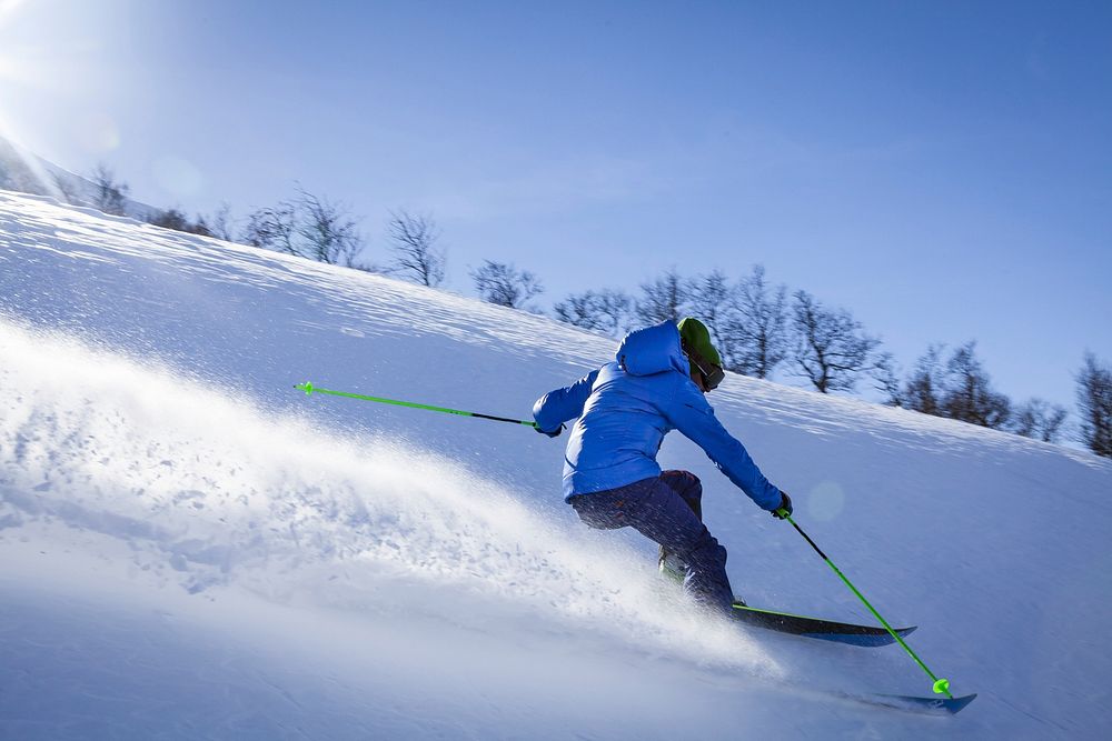 Free skier tumbling through deep powder snow photo, public domain sport CC0 image.