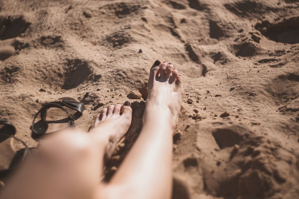Free bare legs in the sand image, public domain vacation CC0 photo.