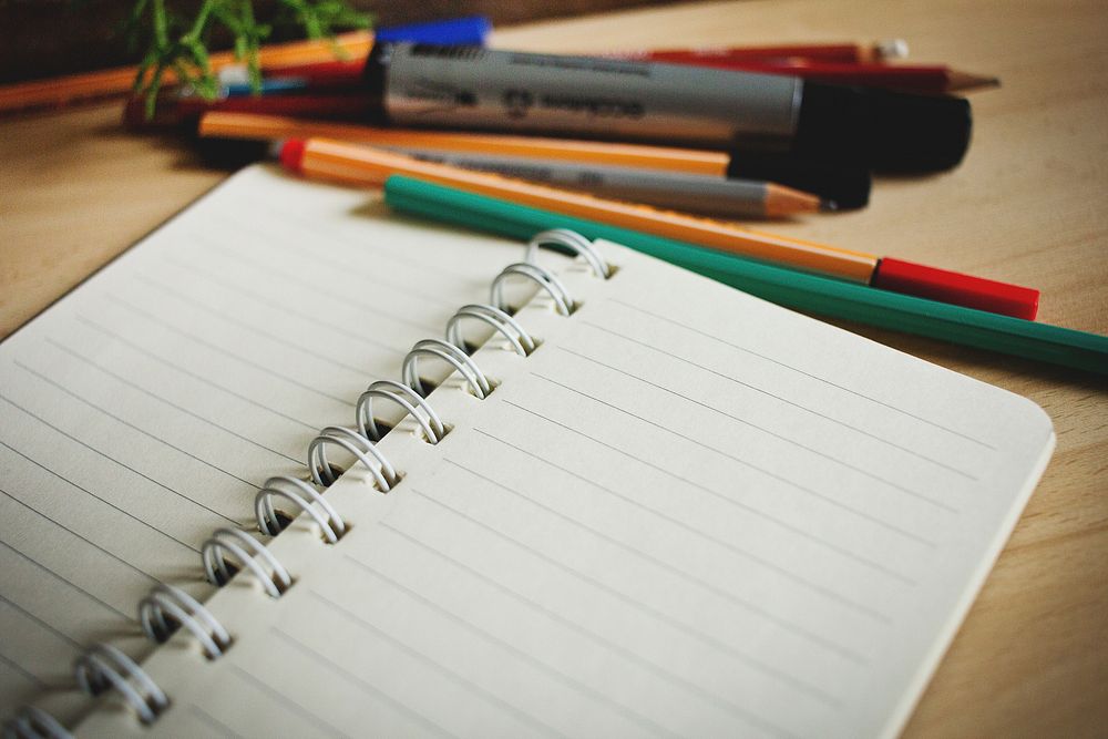 Free open notebook, pens and pencils image, public domain CC0 photo.