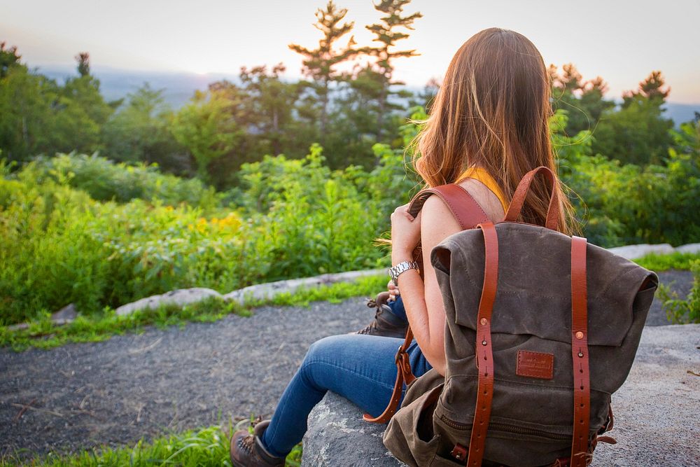 Free woman with backpack image, public domain nature CC0 photo.