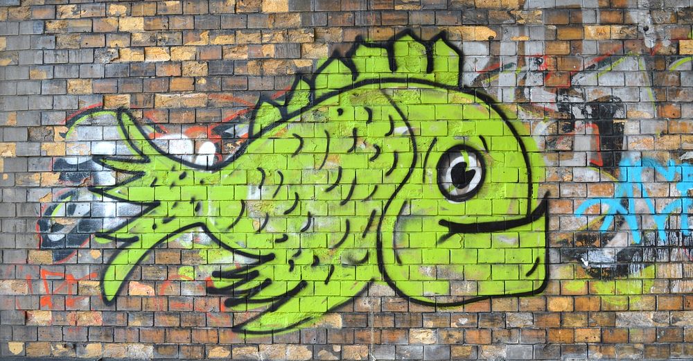 Free brick wall with fish mural graffiti image, public domain CC0 photo.