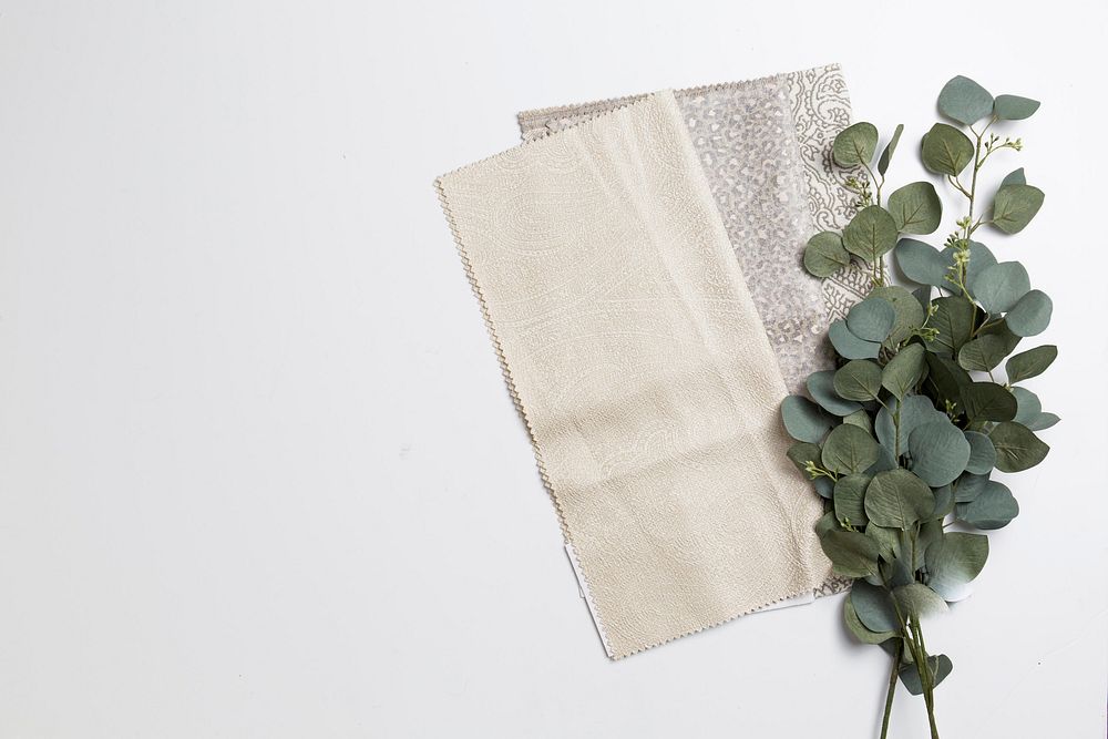 Free fabric pieces and green plant on white table photo, public domain fall CC0 image.