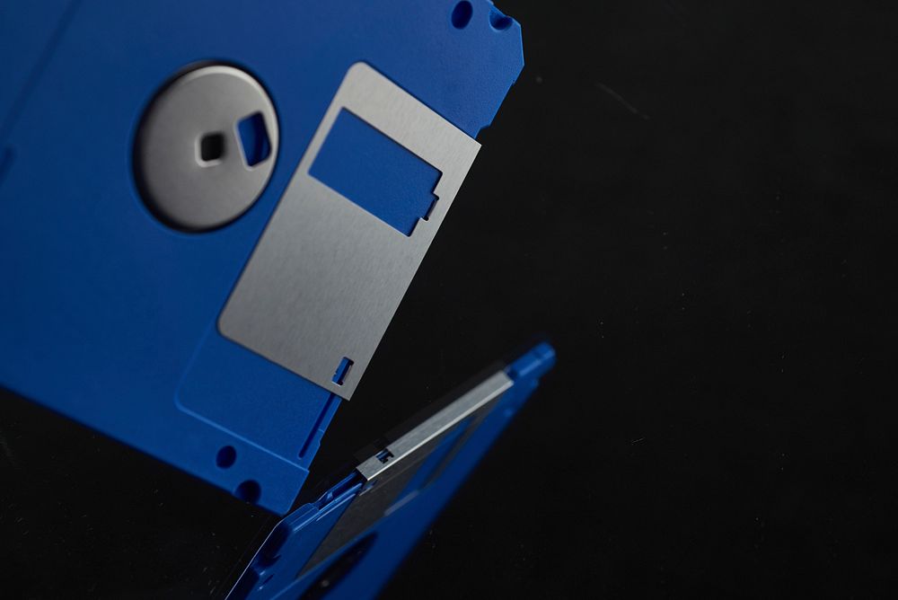 Free close up blue floppy disk image, public domain computer CC0 photo.