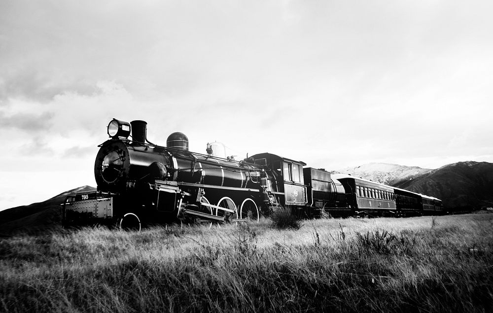 Steam train in a open countryside.