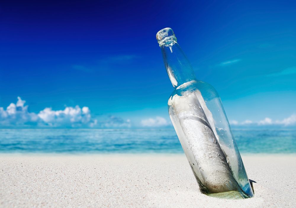 Message in a bottle on a beach