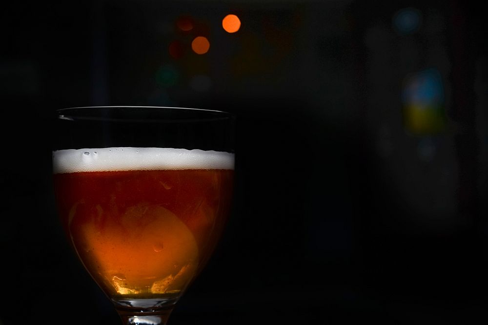 Glass of beer in the dark