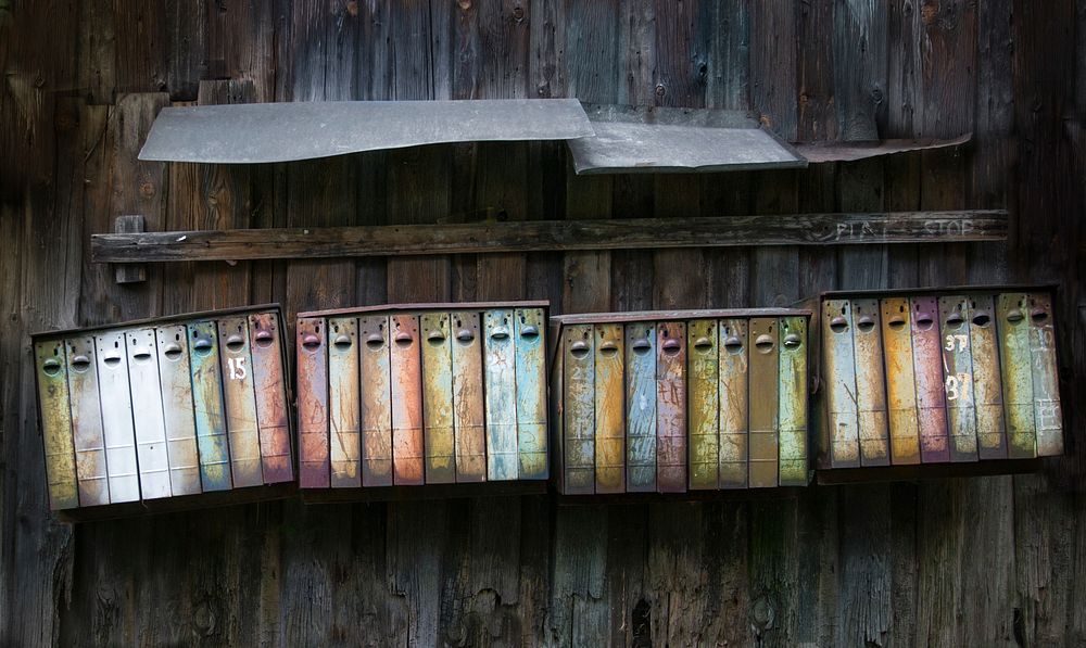 Free mail boxes on wall photo, public domain post CC0 image.