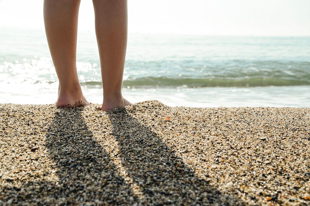 Free woman at beach image, public domain summer vacation CC0 photo.