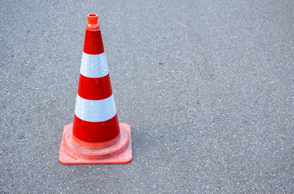 Free traffic cone on the road image, public domain CC0 photo.