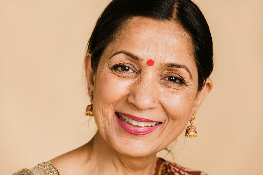 Happy Indian woman wearing a bindi 