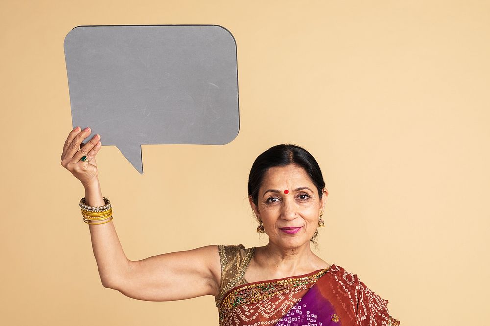 Indian woman holding a speech bubble mockup 