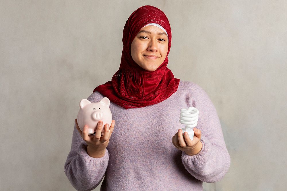 Muslim woman saving the energy