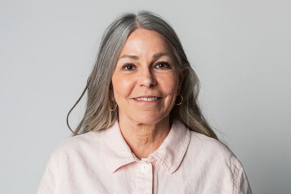 Happy senior woman in a studio shoot