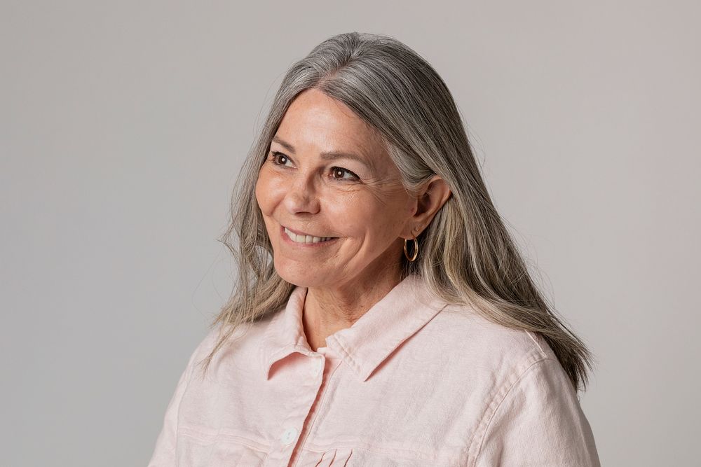 Happy senior woman in a studio shoot