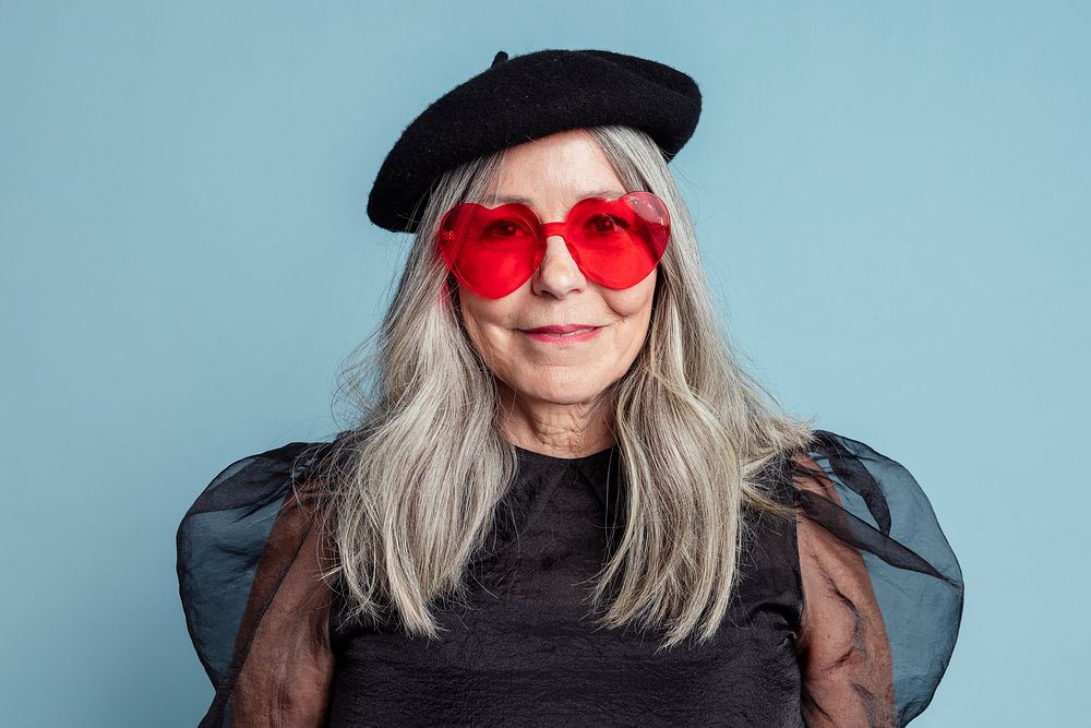 Cool grandma in red heart-shaped shades