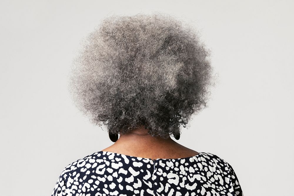 Rear view of a black senior woman with afro hair 