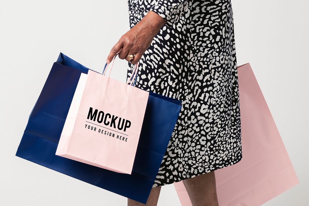 Black woman carrying shopping bag mockups 