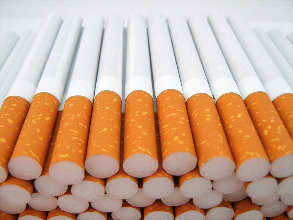 Free stacked cigarettes image, public domain tobacco CC0 photo.