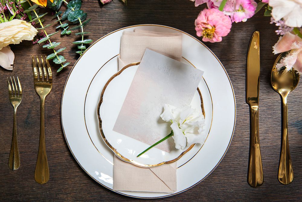Invitation card mockup on a plate in a reception