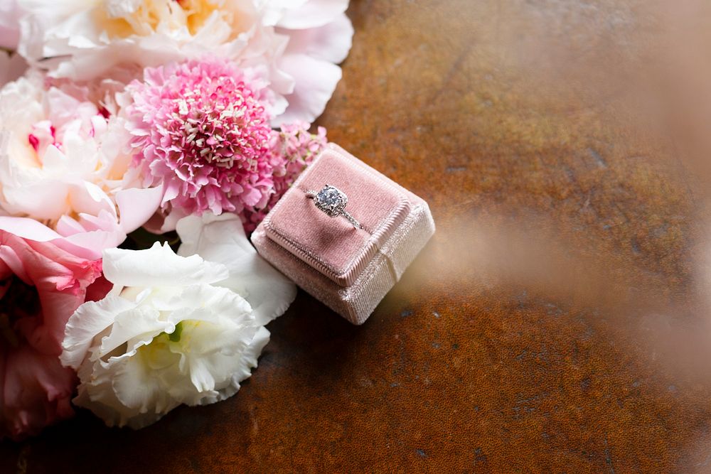 Beautiful flowers by a diamond ring