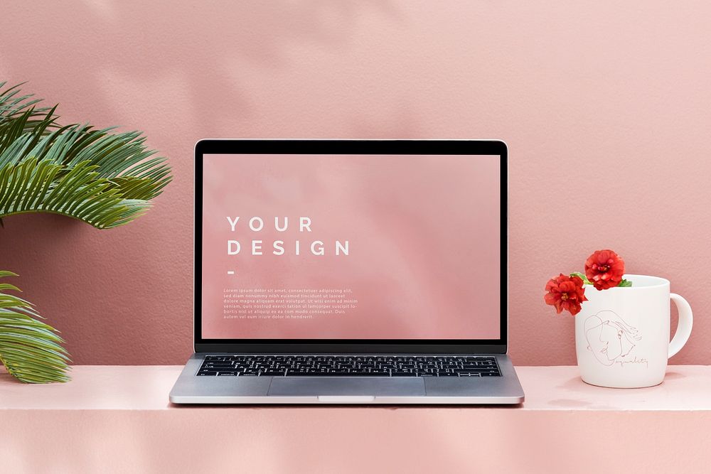 Laptop mockup with a pastel pink wall