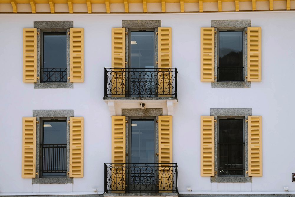 Old-fashioned yellow balcony in Chamonix Mont Blanc Valley