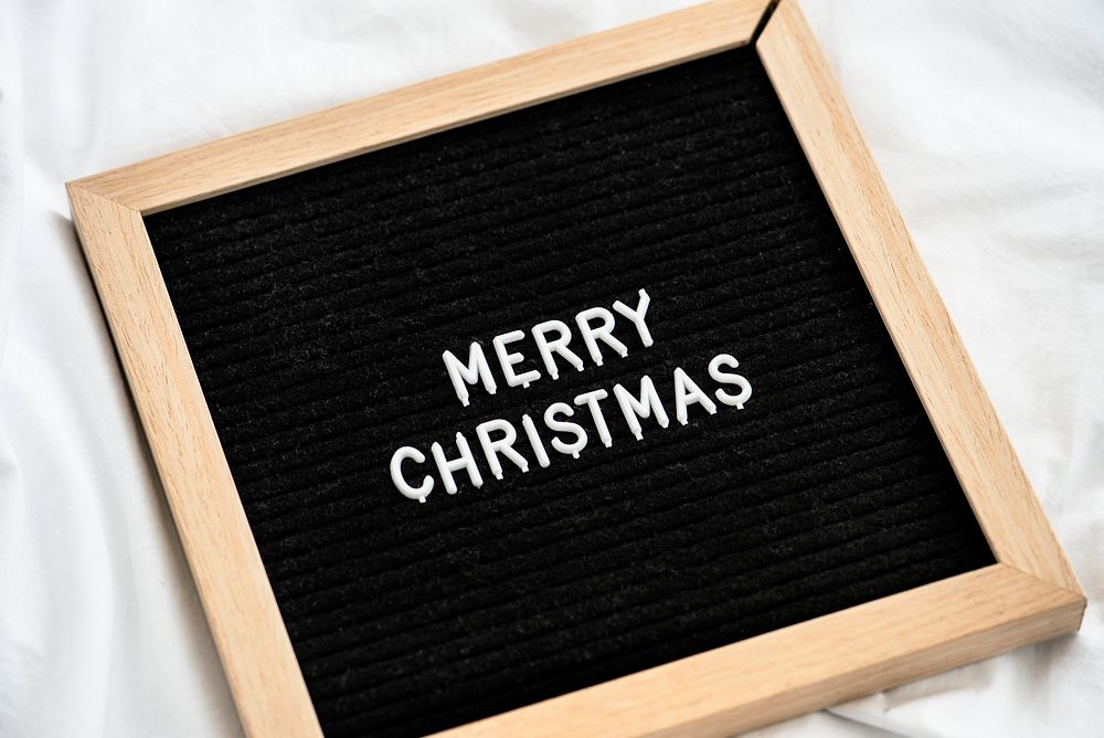 Merry Christmas on a wooden frame