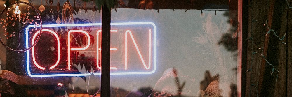 Neon open sign in the window of a restaurant