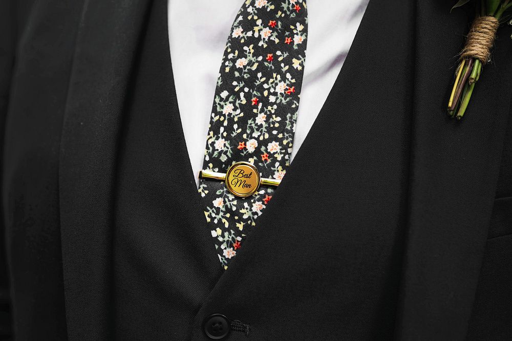Closeup of a best man with a boutonniere