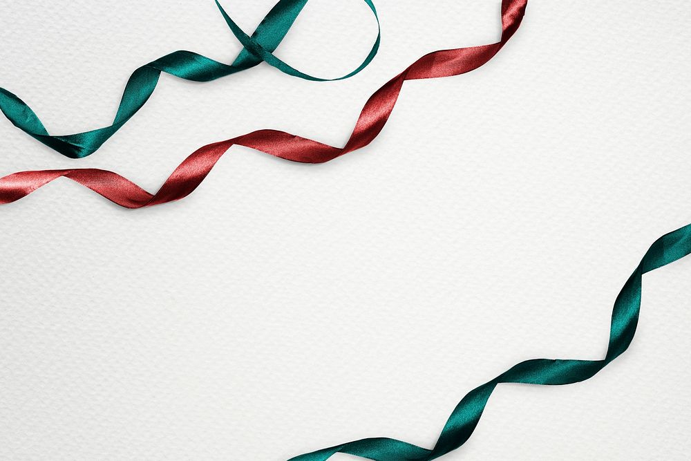 Green and red ribbons decorated on design space background