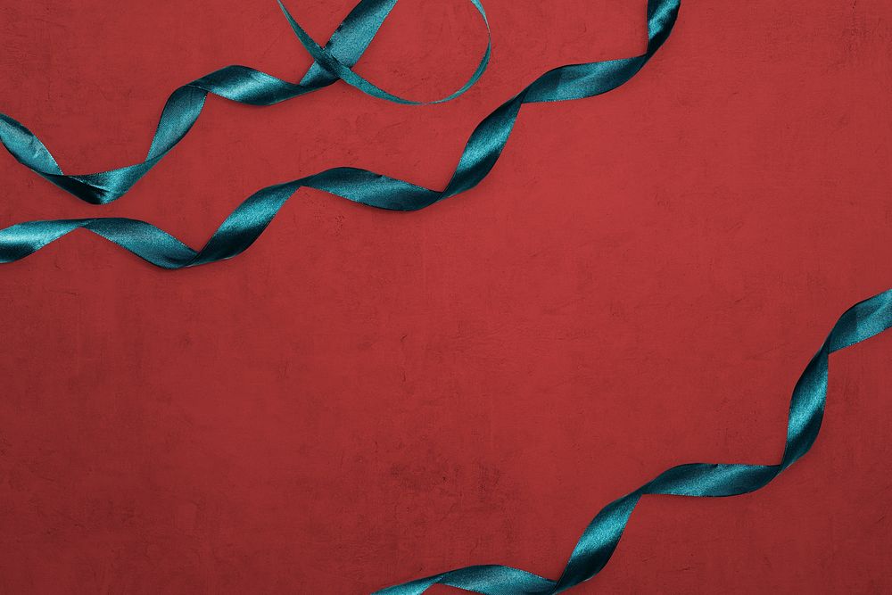 Green ribbons decorated on red background