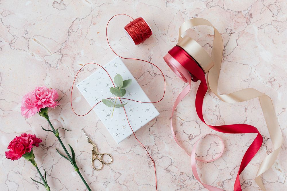 Valentine's surprise gift on a pink marble table