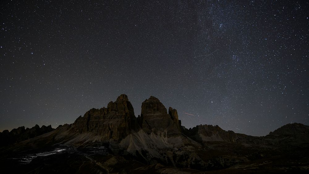 Landscape desktop wallpaper background, Tre Cime di Lavaredo at night in the Dolomites, Italy