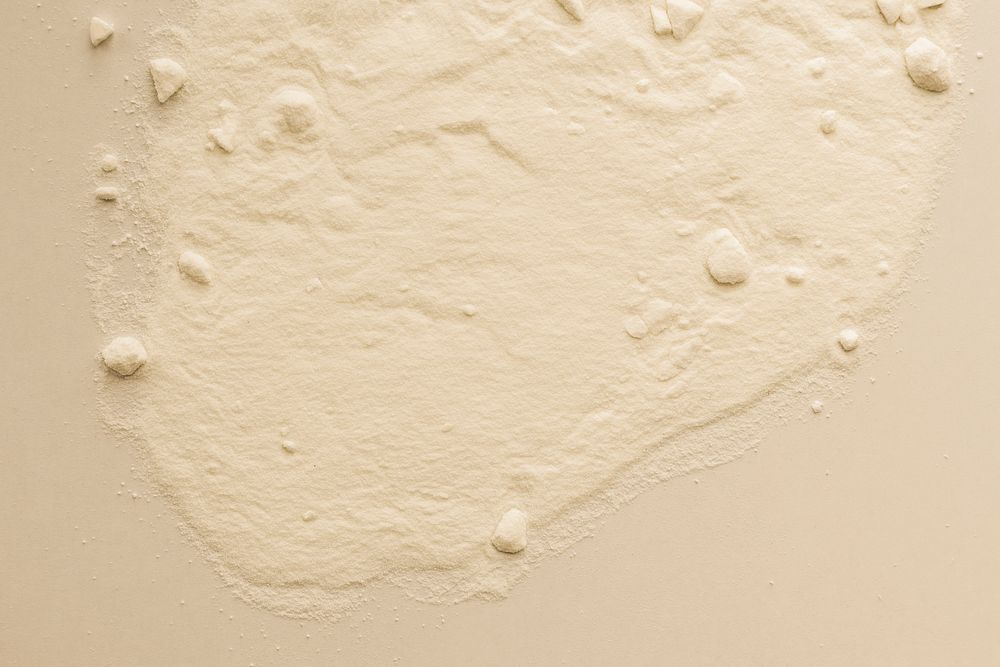 Beige dried color powder texture background