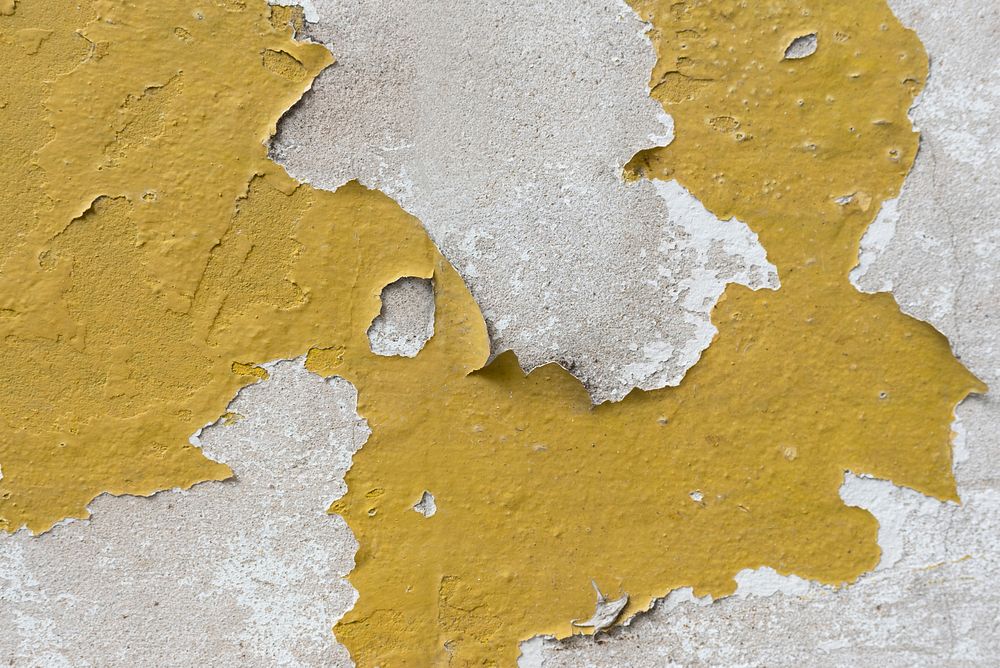 Yellow aged cracked wall texture background