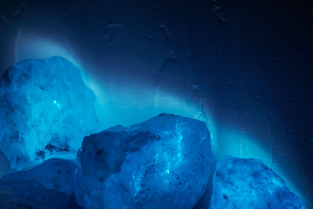 Natural and coarse pink Himalayan salt crystal rocks in negative effect photography