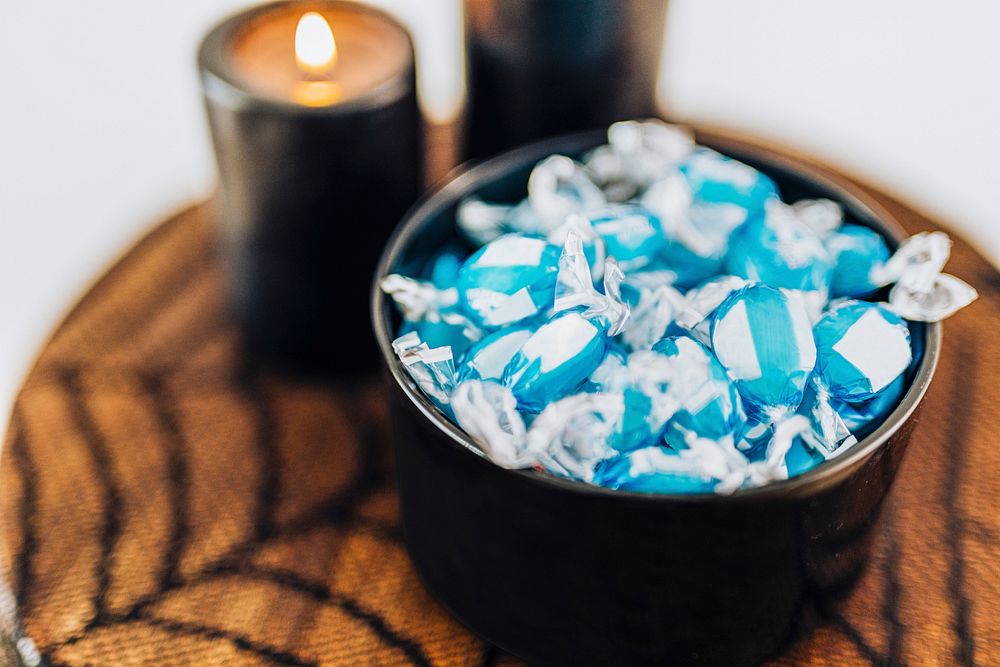 Halloween candies in a bowl on a table 