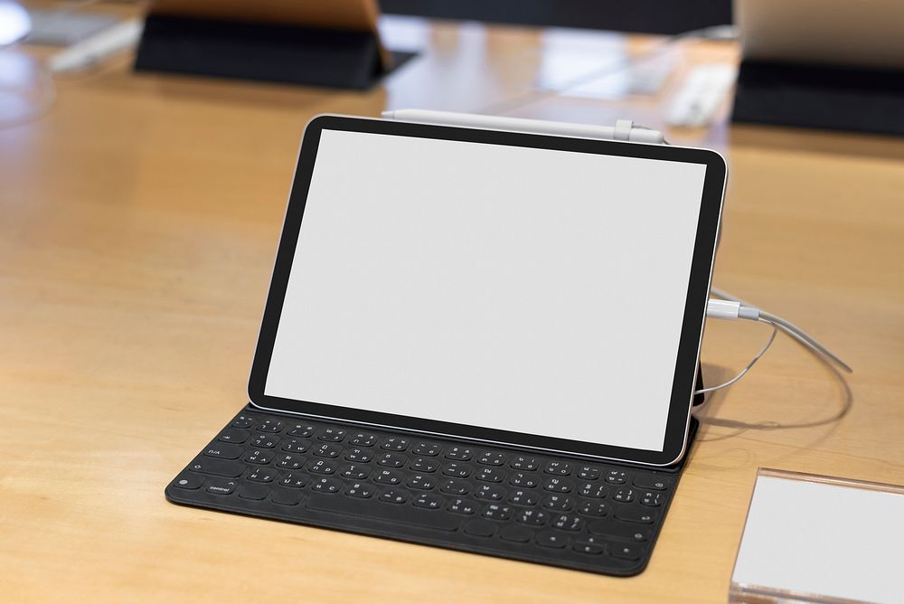 Blank tablet with keyboard product showcase in a shop