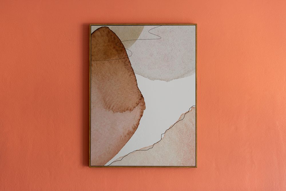 Blank picture frame hanging on a wall