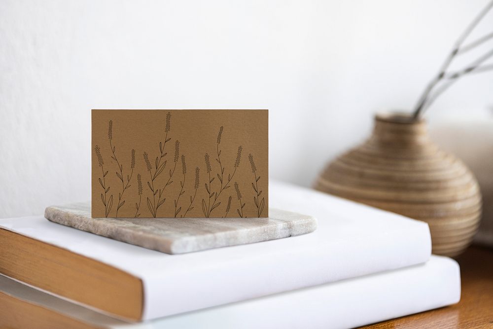 Floral business card with calm aesthetics on a table
