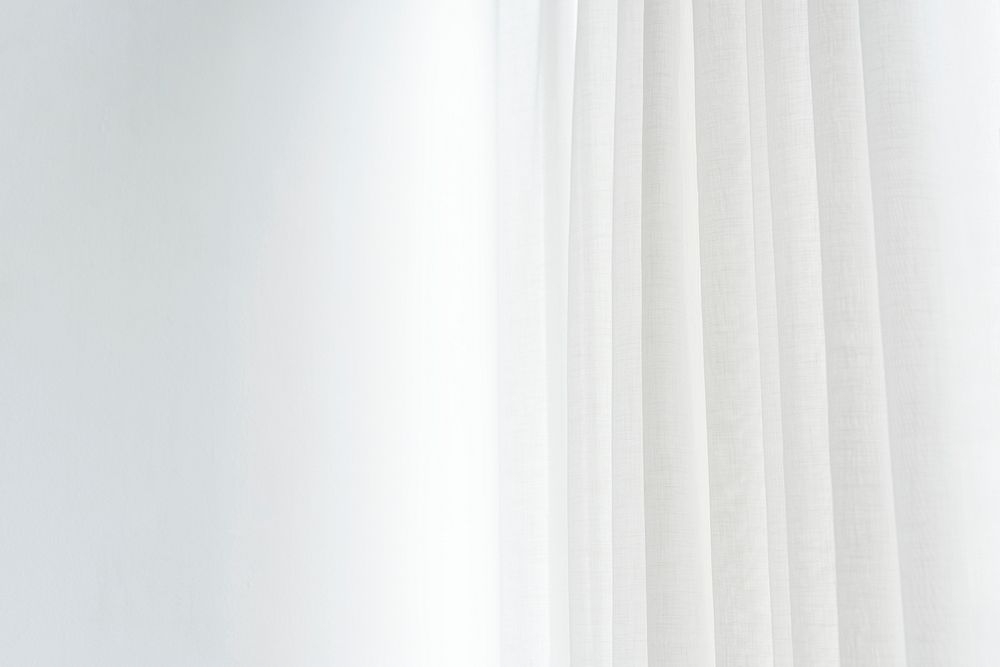 White pleated curtain in a living room