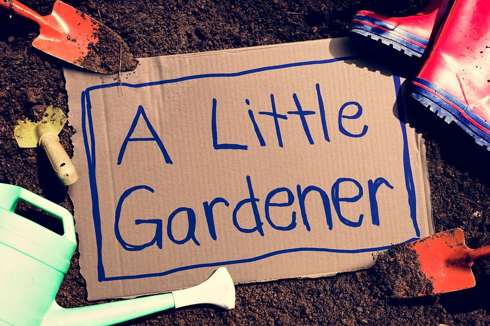A little gardener cardboard poster
