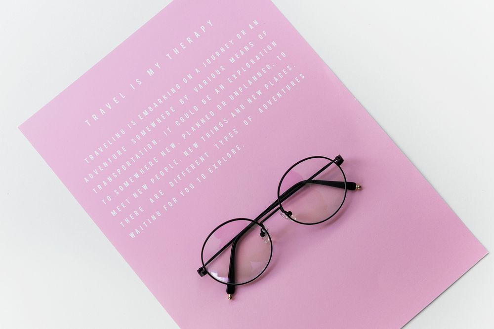 Eyeglasses with pink paper with message