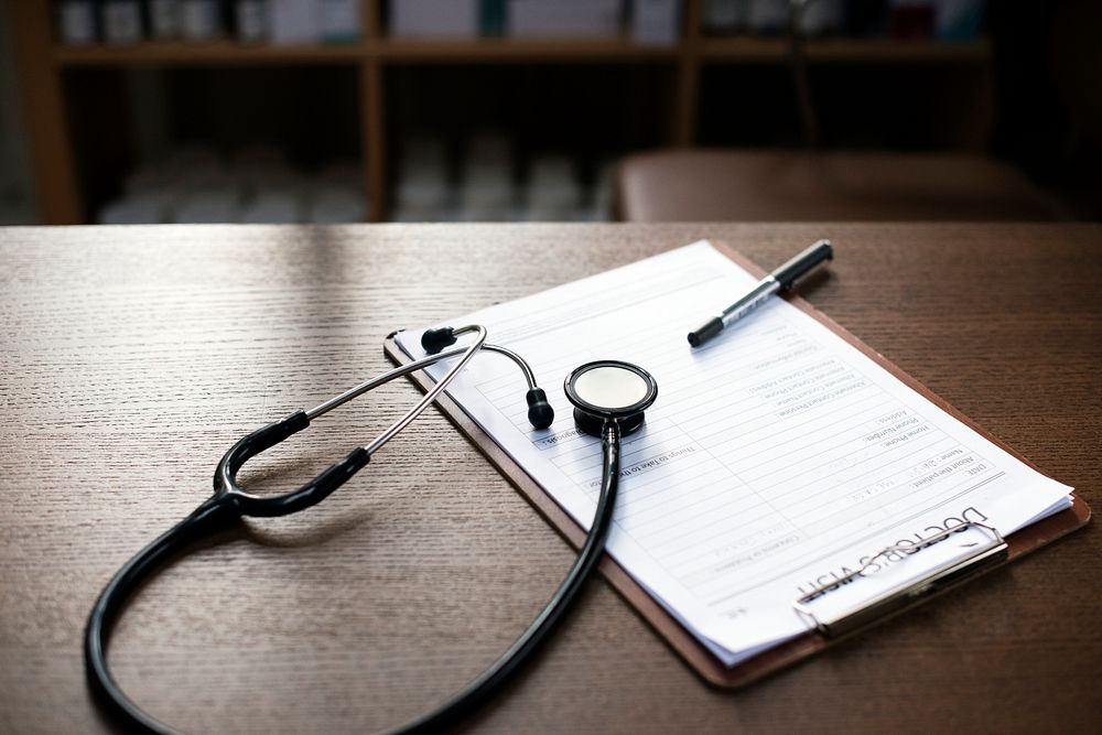 Checkup form and a stethoscope