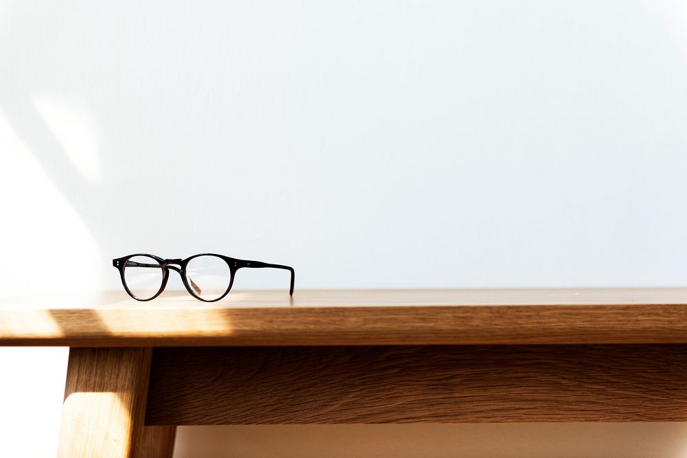An eyeglasses on wooden table