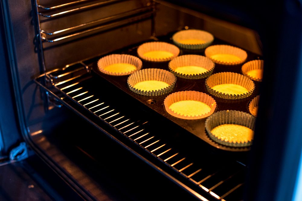 Cupcake batter going into the oven