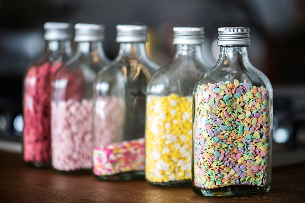 Bottles with colorful sprinkles